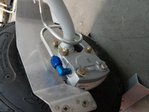 Safety wire on left brake caliper