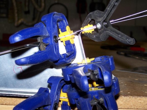 Clamped up with spacer to simulate the hinge thickness.