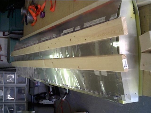 Stabilizer with clear template on skin and ferring strips ready to be clamped down for drilling