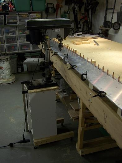 Drill caddy at work drilling spar caps