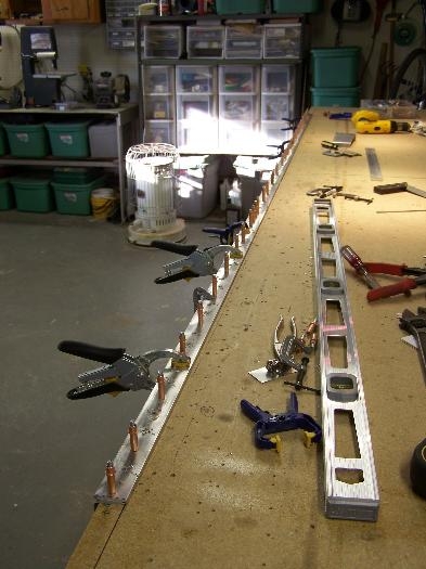 Set up and drilling of cap angles for spar caps