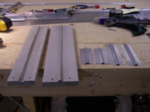 Press die with completed hat stiffeners