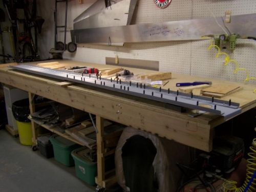 Spar ready for riveting. Not the 6 springs supporting the assembly.