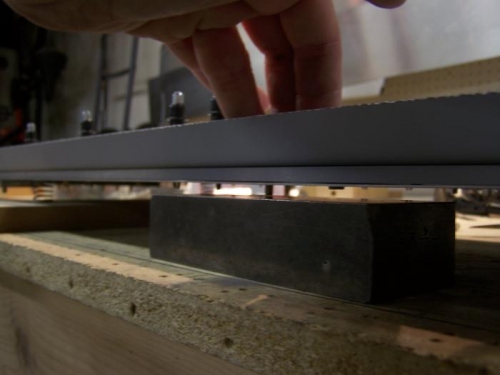 Close up of bucking bar under spar assembly. Note springs.