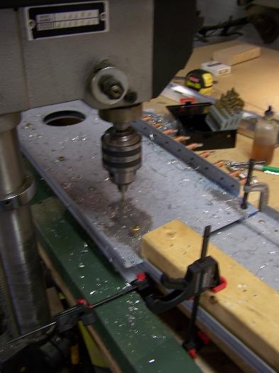 Drilling main bolt holes.