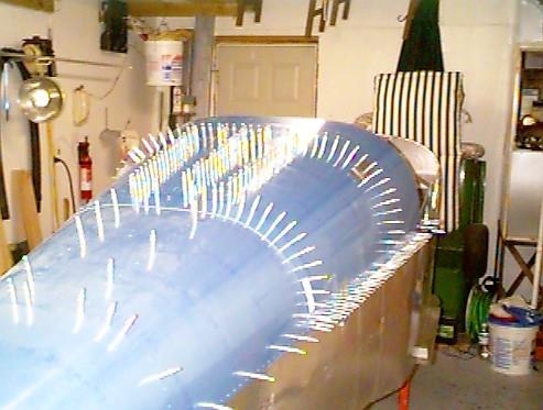 Forward turtledeck skin clecoed in place.