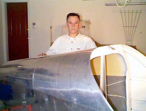 Me with the fuselage, turtle deck riveted on.