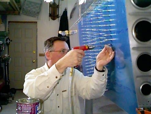 Me drilling the right wing top skin to the ribs.