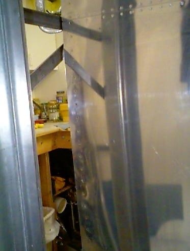 Right wing bottom skin riveted to the outboard rib.