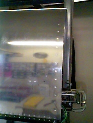 Right wing leading edge top skin riveted to the outboard rib.