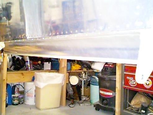 Right wing aileron gap seal installed.