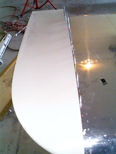 Top view of the right wing tip clecoed in place.