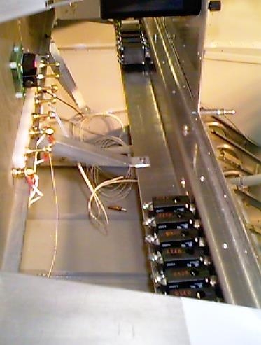 Side view behind panel shows braces.