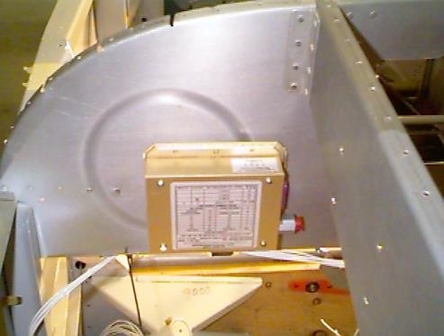 Altitude encoder mounted on the rear of the center bulkhead.