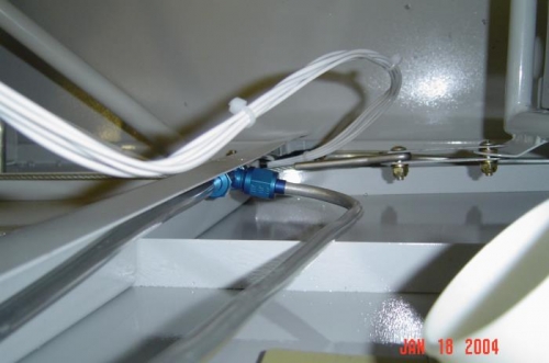 Purge line teeing into the vent line for the right fuel tank.