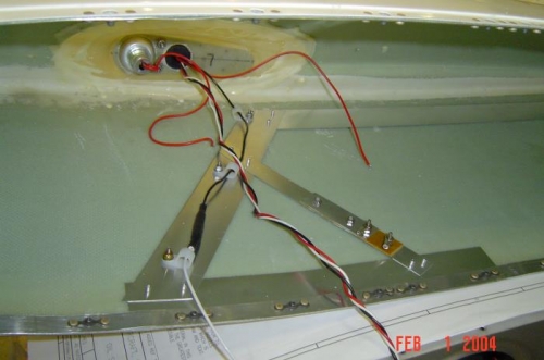 Left wingtip light module and nav antenna.