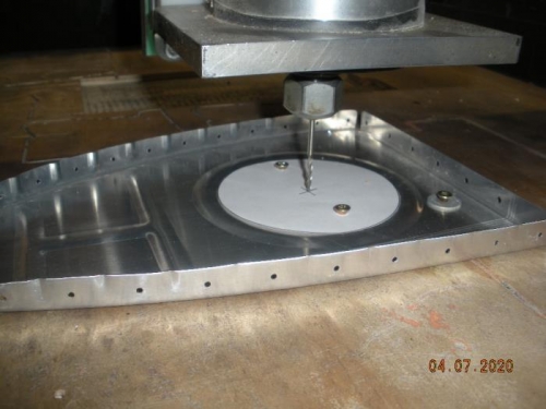 Locating the center of the cutout.