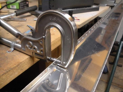 Squeezer mounted to work bench