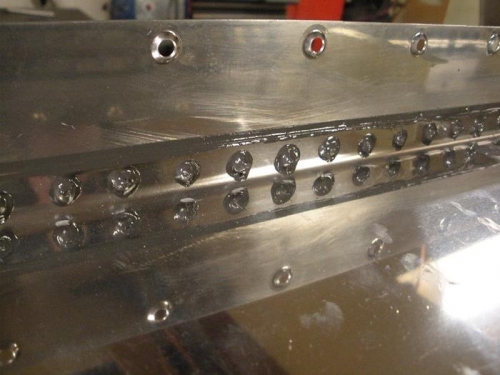 Baffle rivet sealing