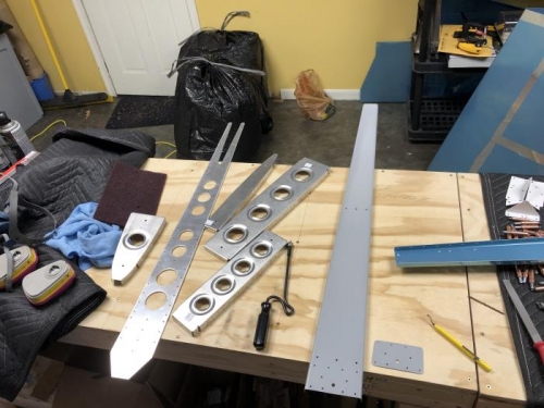 Primed spar and doubler, pieces that have been edge deburred.