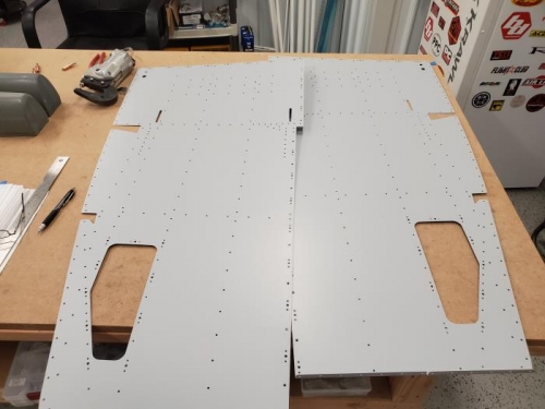 Fuselage floors dimpled, primed and nutplates attached