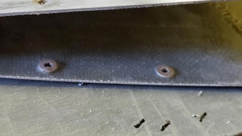 Aluminum washers added to improve riveting