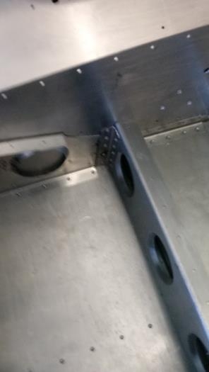 Added 4 rivets to rear L brace