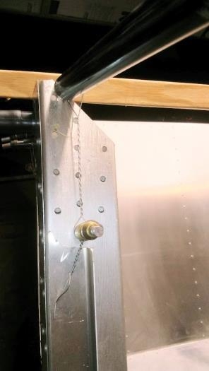 Safety wired frame to fusulage