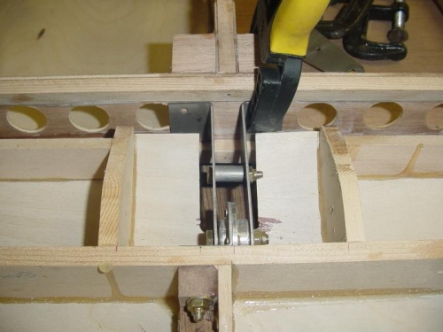 note position of hinge mounting hole and hardpoint