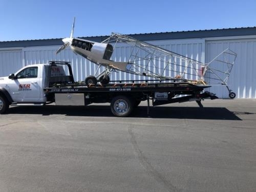 Fuselage loaded on truck for move
