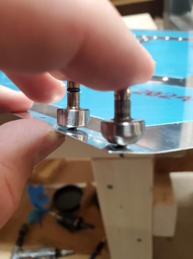 Modified male die next to normal male die