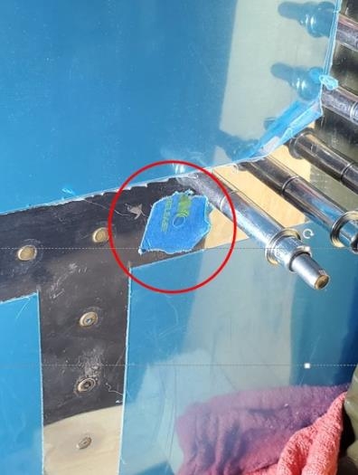 Painters tape over rivet