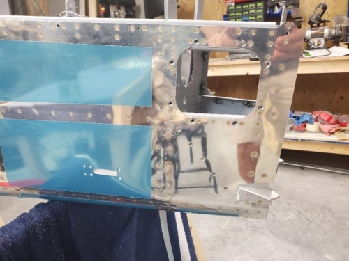 Left side nut plates and rudder stop installed