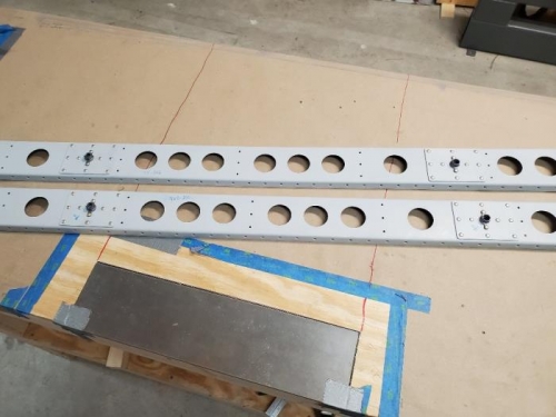Hinge reinforcement plates and front spar