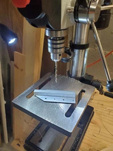 Drilling tie down bracket