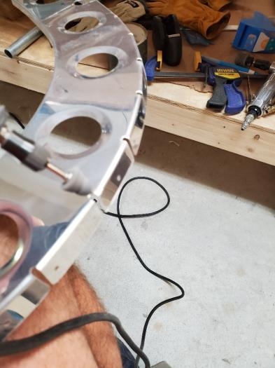 Dremel with scotchbrite wedge used to round faceted corners