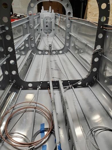 Cabling run with snap bushings installed