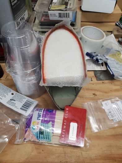 Fiberglass sheets laid inside tip fairing