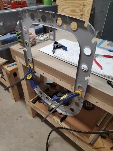 Clamped bulkhead for riveting