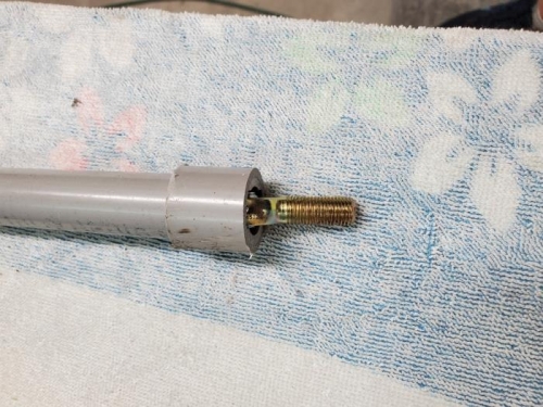 Collar slid over PVC pipe at notched end.