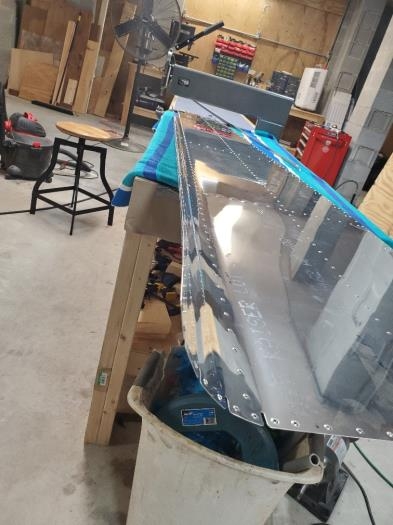 Bottom edge of side skin dimpled