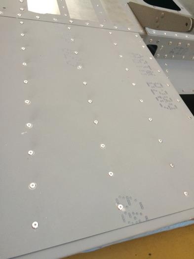 Left wing rivets - Dremelling.