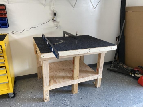 Dimpling table stand