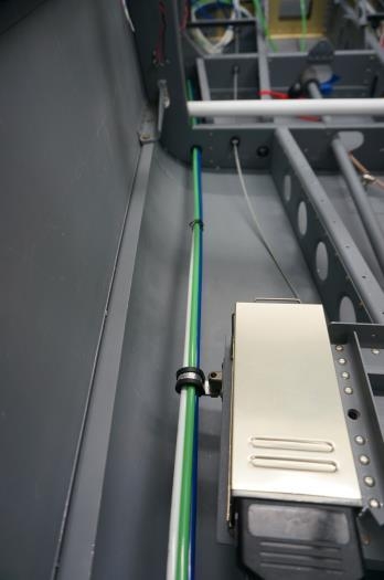 Lines clamped to battery tray