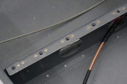 Nutplate installed on baggage rails