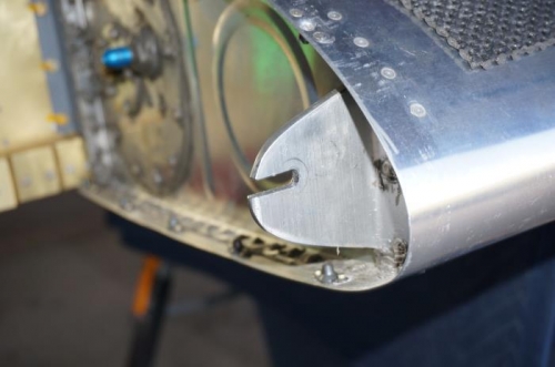 Slot cut in fuel tank angle