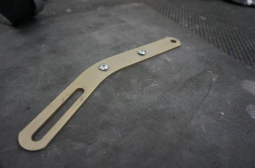 Blind rivets in alternator belt tension arm