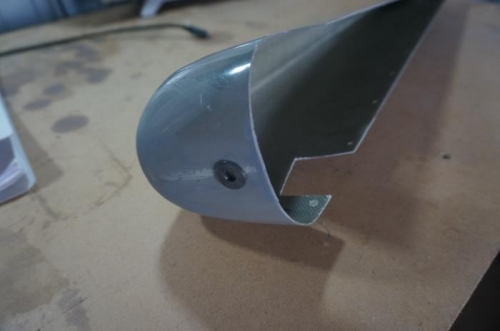 Grommet in rudder bottom for tail light wire