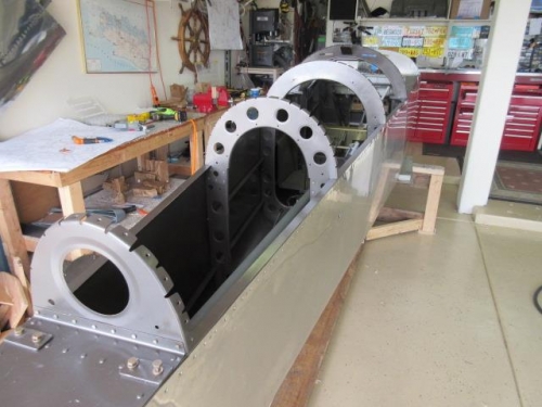 Bulkheads riveted to fuselage