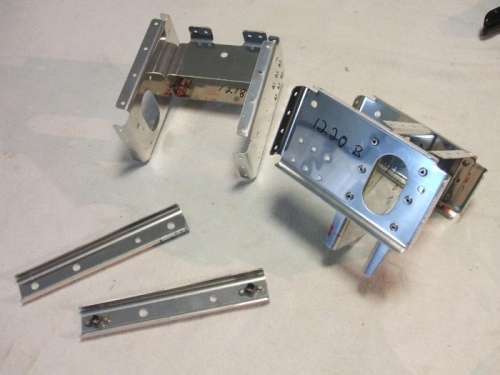 Pulley and flaperon mixer brackets